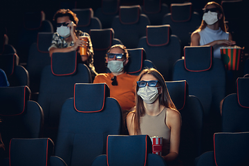 Image showing Cinema, movie theatre during quarantine. Coronavirus pandemic safety rules, social distance during movie watching