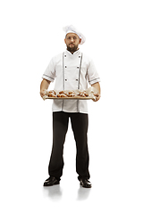 Image showing Cooker, chef, baker in uniform isolated on white background, gourmet.