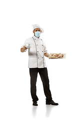 Image showing Cooker, chef, baker in uniform isolated on white background, gourmet.