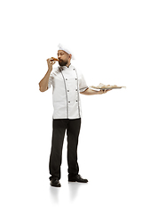 Image showing Cooker, chef, baker in uniform isolated on white background, gourmet.