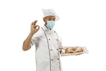 Image showing Cooker, chef, baker in uniform isolated on white background, gourmet.