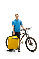 Image showing Deliveryman isolated on white studio background. Contacless delivery service during quarantine.