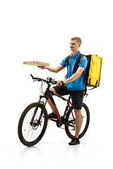 Image showing Deliveryman isolated on white studio background. Contacless delivery service during quarantine.