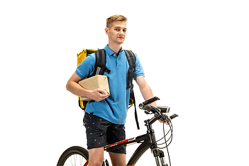 Image showing Deliveryman isolated on white studio background. Contacless delivery service during quarantine.