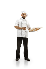 Image showing Cooker, chef, baker in uniform isolated on white background, gourmet.