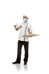 Image showing Cooker, chef, baker in uniform isolated on white background, gourmet.