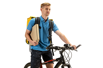 Image showing Deliveryman isolated on white studio background. Contacless delivery service during quarantine.