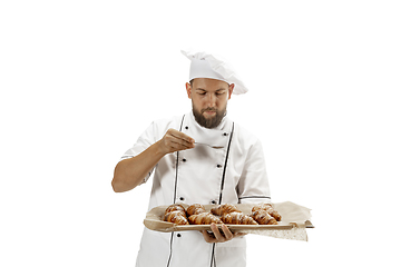 Image showing Cooker, chef, baker in uniform isolated on white background, gourmet.