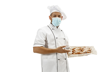 Image showing Cooker, chef, baker in uniform isolated on white background, gourmet.