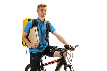 Image showing Deliveryman isolated on white studio background. Contacless delivery service during quarantine.