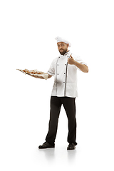 Image showing Cooker, chef, baker in uniform isolated on white background, gourmet.