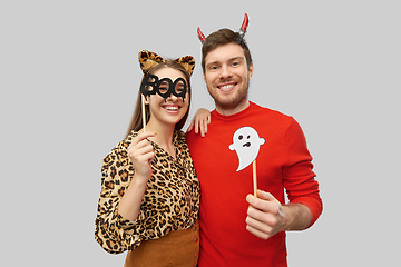 Image showing couple in halloween costumes of devil and leopard