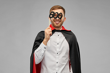 Image showing happy man in halloween costume of vampire