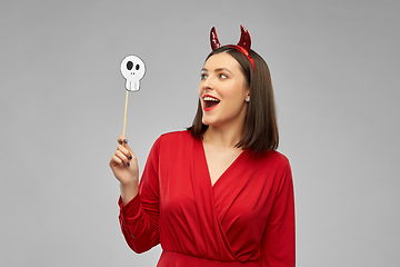 Image showing happy woman in red halloween costume of devil