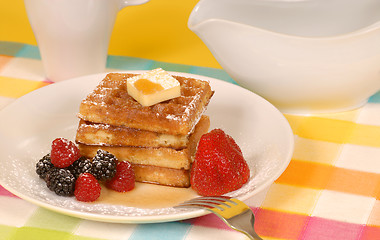 Image showing Waffles with fruit and powdered sugar