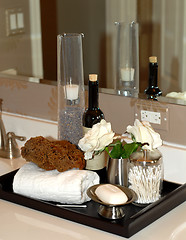 Image showing Toiletries and bath items on bathroom vanity