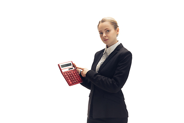 Image showing Young woman, accountant, booker in office suit isolated on white studio background