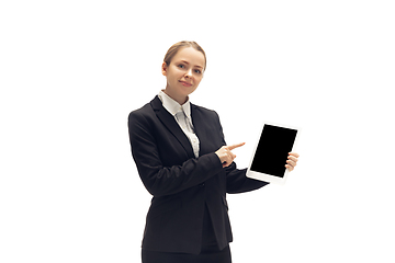 Image showing Young woman, accountant, booker in office suit isolated on white studio background