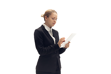 Image showing Young woman, accountant, booker in office suit isolated on white studio background