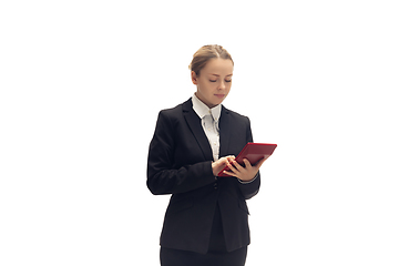 Image showing Young woman, accountant, booker in office suit isolated on white studio background