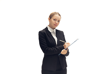 Image showing Young woman, accountant, booker in office suit isolated on white studio background