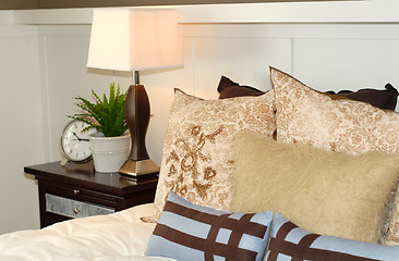 Image showing Bedroom scene with bed and nightstand