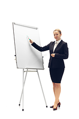 Image showing Young woman, accountant, booker in office suit isolated on white studio background