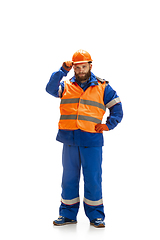 Image showing Handsome contractor, builder isolated over white studio background