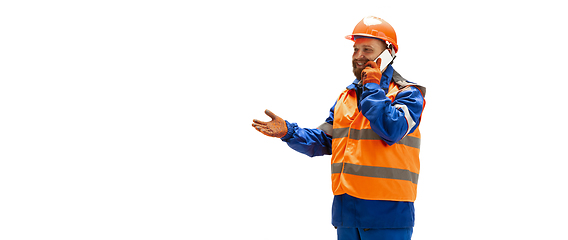 Image showing Handsome contractor, builder isolated over white studio background