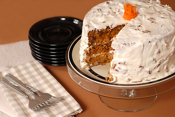 Image showing Whole carrot cake with cream cheese and pecan frosting