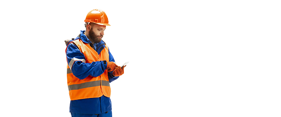 Image showing Handsome contractor, builder isolated over white studio background