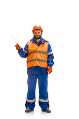 Image showing Handsome contractor, builder isolated over white studio background