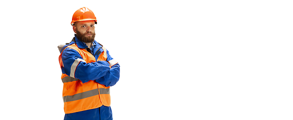 Image showing Handsome contractor, builder isolated over white studio background