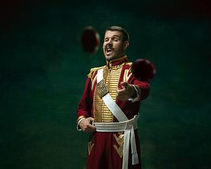 Image showing Young man as Nicholas II on dark green background. Retro style, comparison of eras concept.