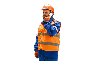 Image showing Handsome contractor, builder isolated over white studio background