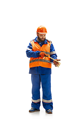 Image showing Handsome contractor, builder isolated over white studio background