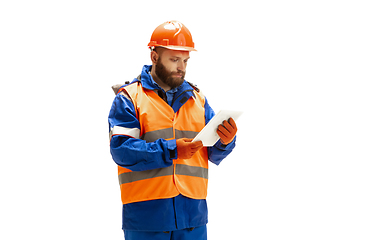 Image showing Handsome contractor, builder isolated over white studio background