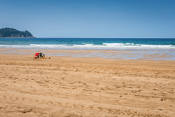 Image showing Lifeguards seats on the beach near the ocean