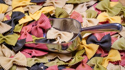 Image showing Colored Farfalle Pasta bow tie pasta background.