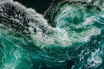 Image showing Waves of water of the river and the sea meet each