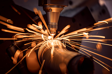 Image showing CNC Laser cutting of metal, modern industrial technology.