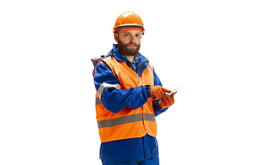 Image showing Handsome contractor, builder isolated over white studio background