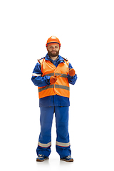 Image showing Handsome contractor, builder isolated over white studio background