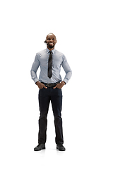 Image showing Young african-american call center consultant with headset isolated on white studio background