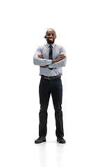 Image showing Young african-american call center consultant with headset isolated on white studio background