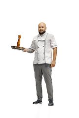 Image showing Portrait of a male chef cook, butcher isolated on a white studio background