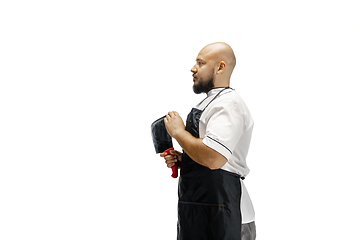 Image showing Portrait of a male chef cook, butcher isolated on a white studio background