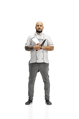 Image showing Portrait of a male chef cook, butcher isolated on a white studio background