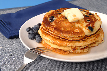 Image showing Blueberry pancakes with maple syrup