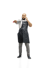 Image showing Portrait of a male chef cook, butcher isolated on a white studio background